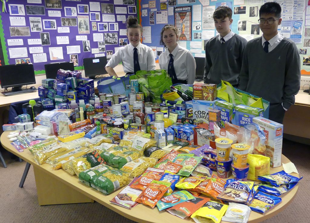 Year 11 Citizenship group with their collection for the homeless